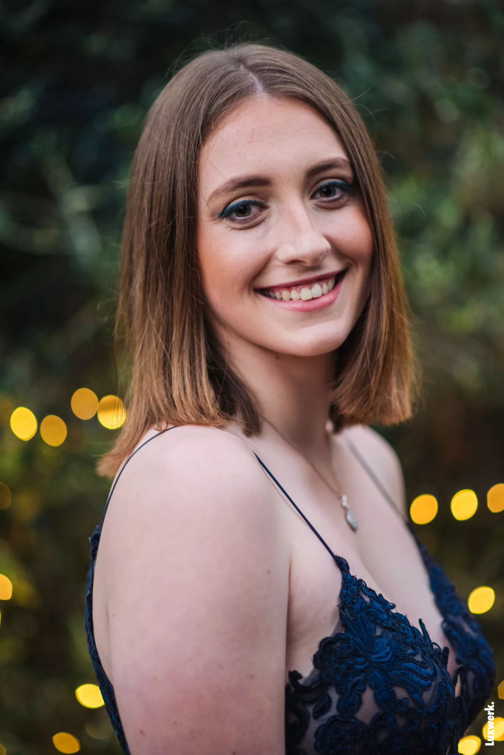 portrait of year 12 graduate at her high school ball in Perth