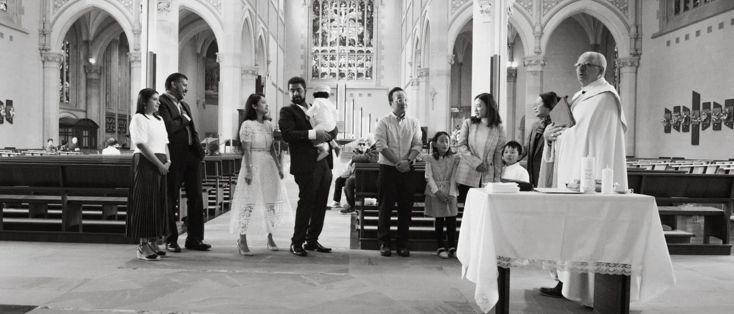 Black and white photo of a baptism ceremony in St. mary's cathedral in Perth