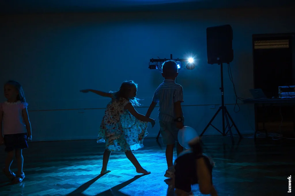 Two kids dancing at an event in Rivervale