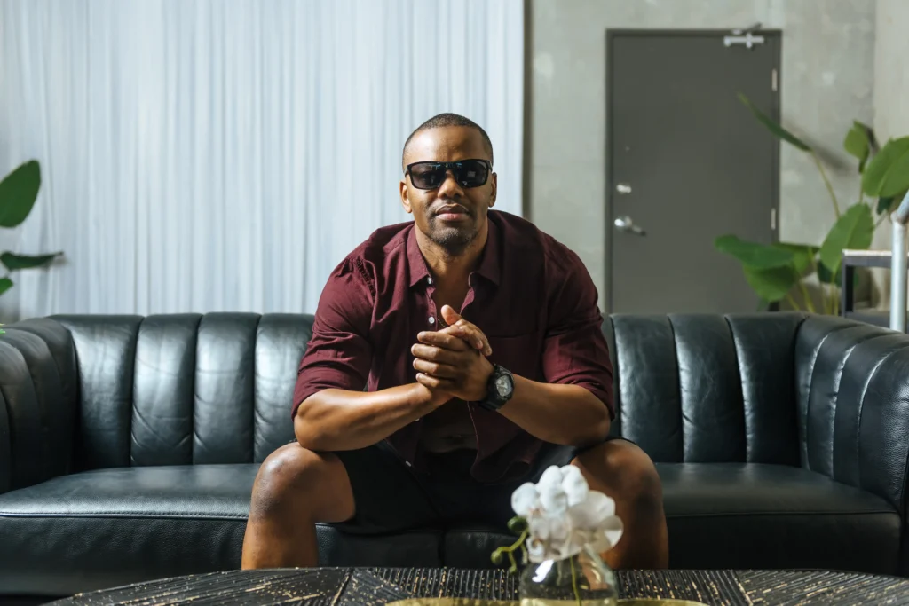 DJ sitting on a couch